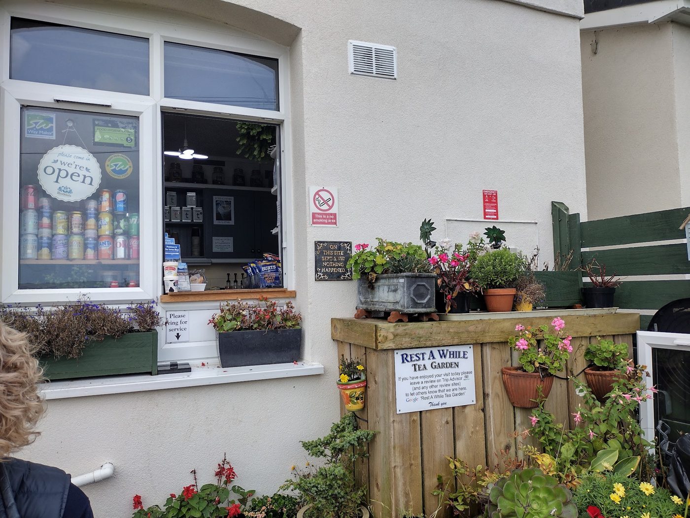 The tea room building, with flower beds at the front